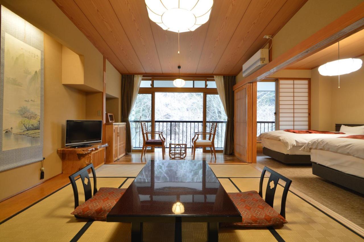 Kurokawa Onsen Oku No Yu Hotel Минамиогуни Екстериор снимка